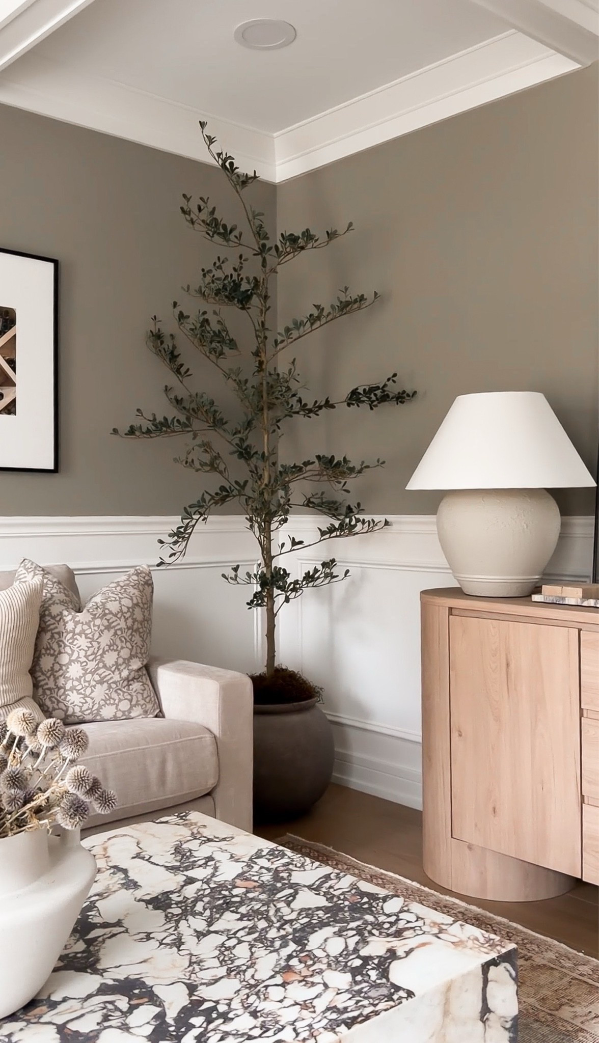 I'm loving this faux 7ft shady lady! The perfect height and organic dimension for this corner in our home office. Sharing a few similar styles, as well as many of the pieces in our home office that we love. Luxe look for less!

#LTKHome