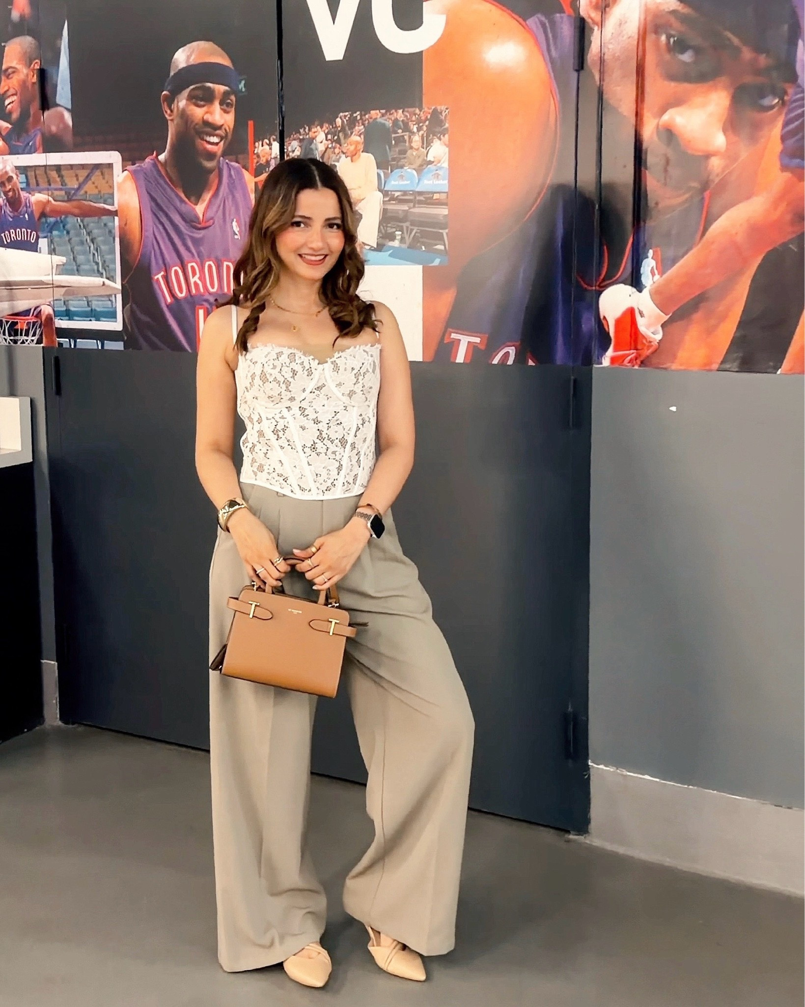 fitted floral corset top paired with soft grey wide-leg trousers and a structured le tanneur small emilie tan handbag. The fitted top and relaxed tailoring create a balanced summer event outfit that feels polished but still comfortable.

#LTKcanada #LTKfall #LTKbag