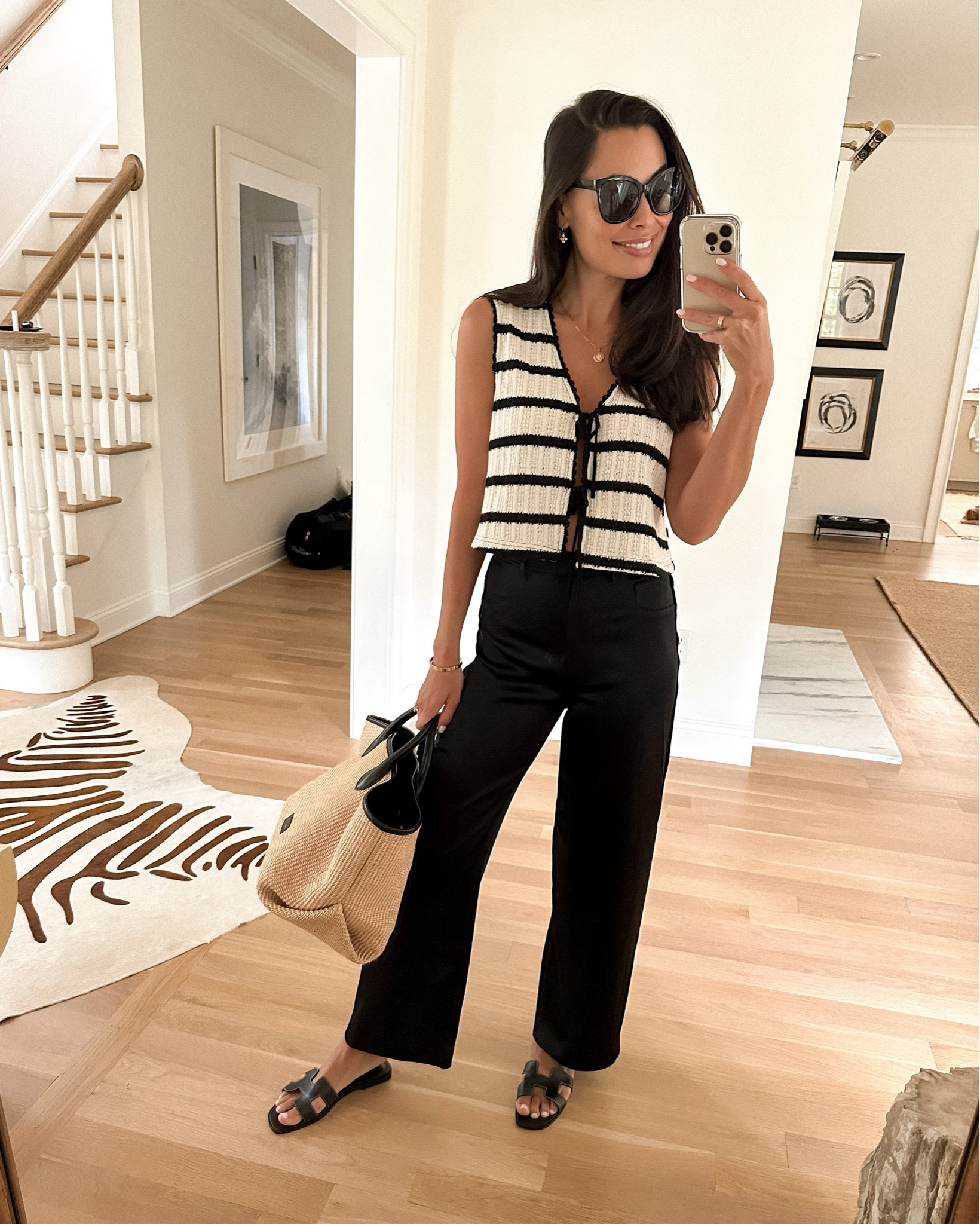 Kat Jamieson wears a stripe top and silk trousers pants. 

#LTKitbag #LTKshoecrush #LTKSeasonal