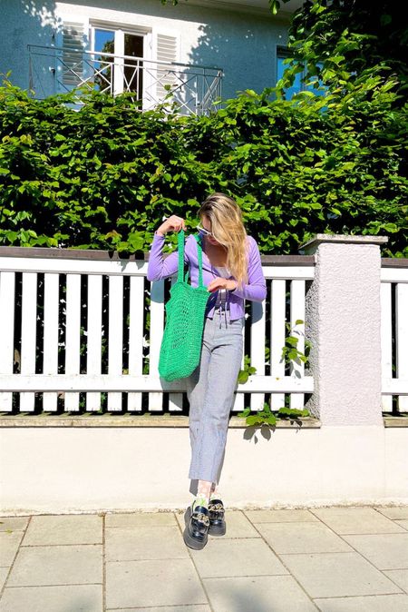 Cute Socks. Fashion Blogger Girl by Style Blog Heartfelt Hunt. Girl with blond hair wearing a purple cardigan, white cat-eye sunglasses, check pants, white top, green straw bag, cute socks and chunky loafers. #colorfuloutfit #colorfulstyle #colorfulfashion #colorfullooks #fashionfun #cutesummeroutfit #summerfashion2023 #summerlookbook #fitcheck #dailylooks #dailylookbook #contentcreator #microinfluencer #discoverunder20k 