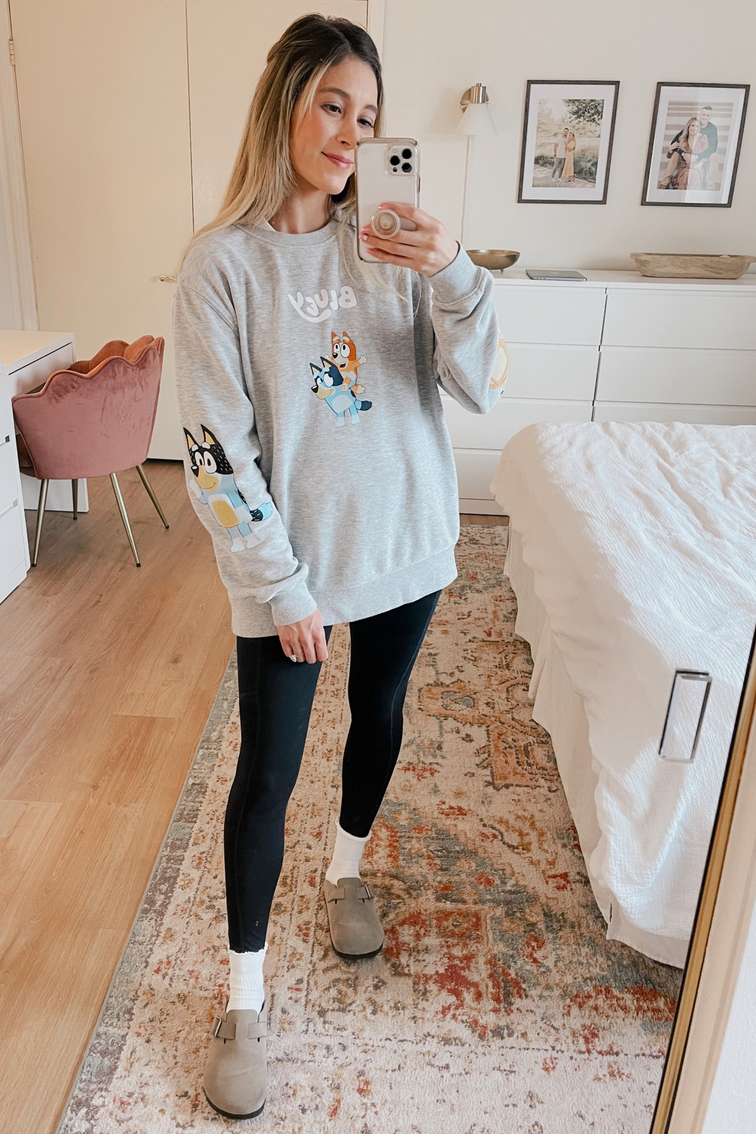 Women's casual and very comfortable outfit. Wearing a Bluey graphic Sweatshirt in size M from Target paired with black Fabletics leggings in size XS. White women's ruffle socks with clog mules. Pink velvet vanity desk chair. Boho area rug from RugsUSA.

#LTKstyletip #LTKfindsunder100 #LTKfamily