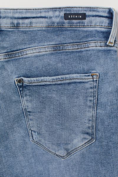 5-pocket jeans in washed, stretch denim with a high waist, zip fly with button, and skinny legs. ... | H&M (US + CA)