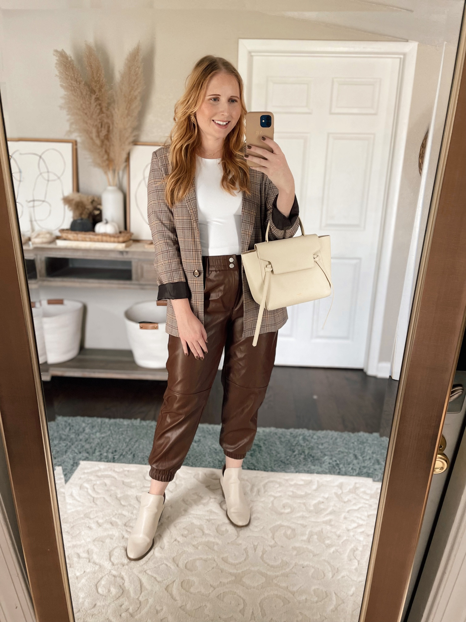 Plaid blazer, white top, dark brown faux leather joggers. Blazer fits TTS wearing size medium. Fall outfit, fall outfits, chic workwear, what to wear to work in the fall, faux leather pants from Walmart. Click to shop!!

#LTKunder100 #LTKworkwear #LTKSeasonal
