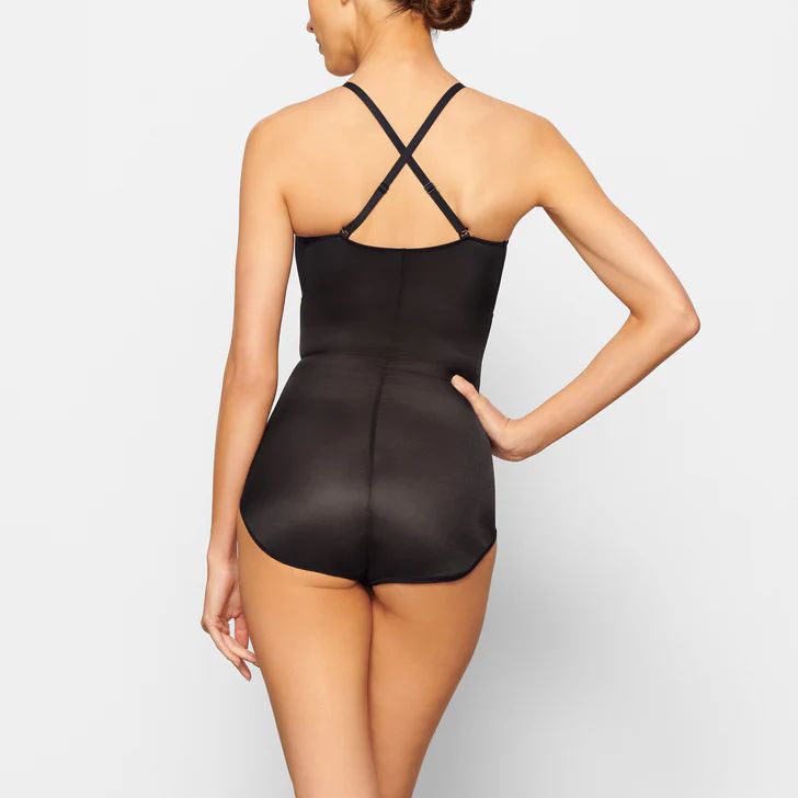 BARELY THERE SHAPEWEAR BODYSUIT BRIEF W/ SNAPS | ONYX | SKIMS (US)