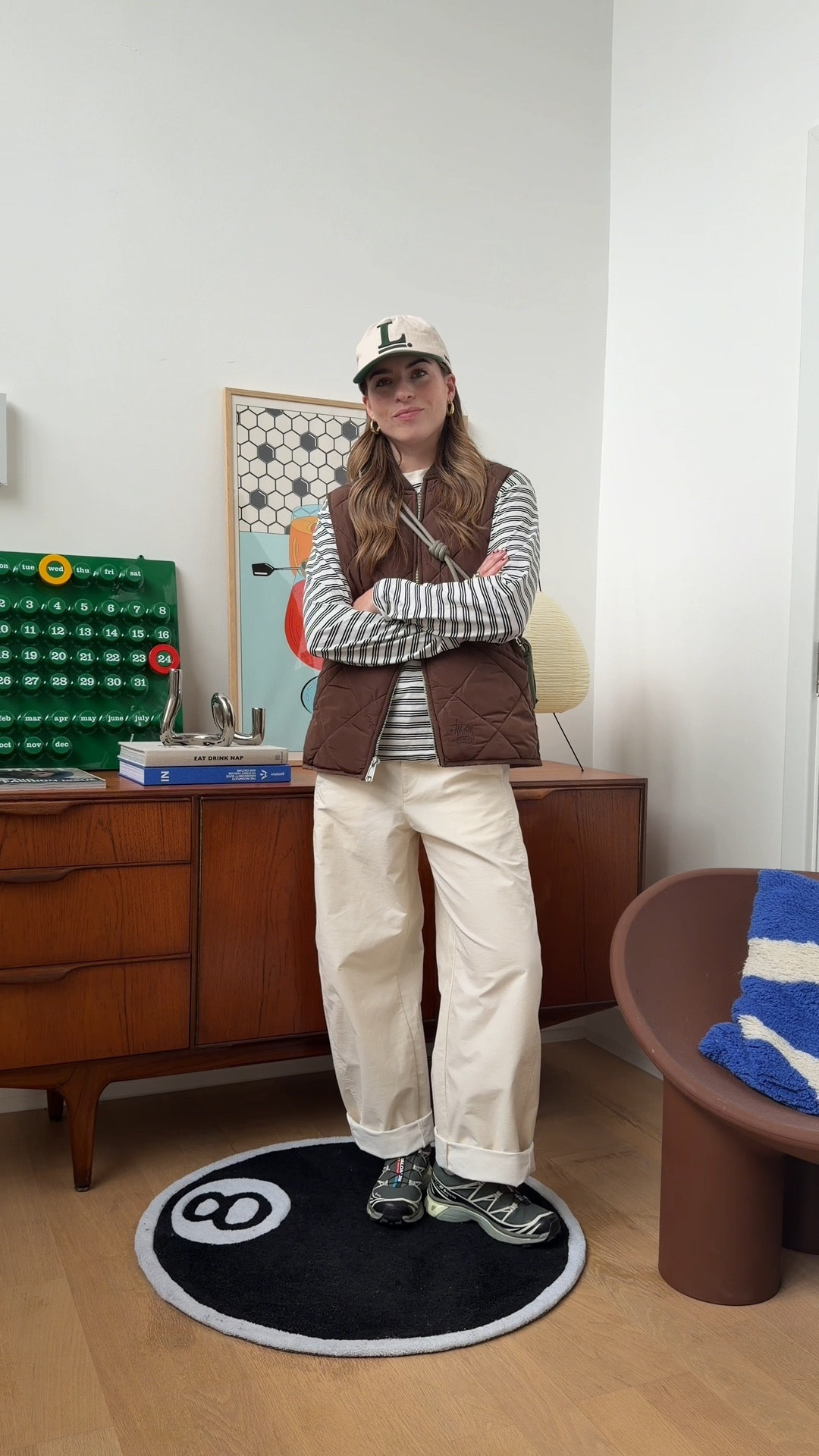 Gilet, brown gilet, casual outfit, stripe top, Uniqlo trousers, cream trousers, Uniqlo barrel leg trousers, Salomon xt6, cap, green cap, porter yoshida bag 

#LTKstyletip #LTKuk #LTKautumn