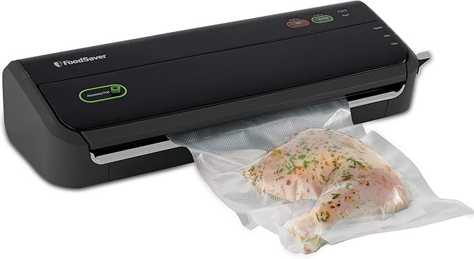 FoodSaver Vacuum Sealer Machine with Starter Vacuum Seal Bags & Rolls, Safety Certified, Black - ... | Amazon (US)