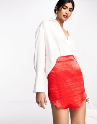 ASOS DESIGN satin mini skirt with curved hem in red | ASOS (Global)