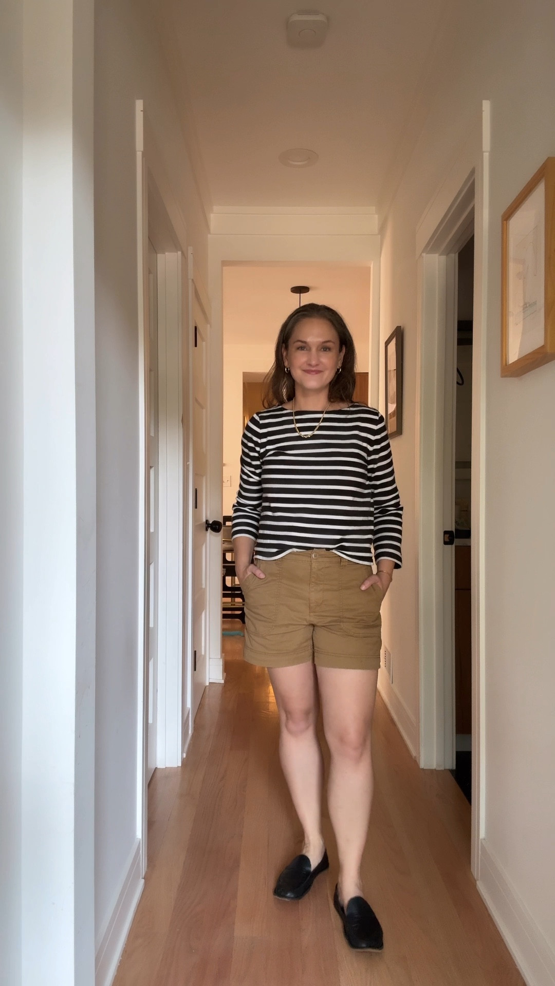 It’s the first day of August, and the city mom is all about comfort with a touch of effortless style. She’s rocking khaki shorts and a black-and-white striped top, the perfect combo for a day spent indoors with her son. Her house slippers are the unsung heroes of the day—soft, comfy, and totally practical—while her go-to gold hoops and graduated rope necklace add just the right hint of chic. And, of course, her new stack of permanent bracelets gleams with every gesture, a small touch of sparkle in a whirlwind day. With the air quality outside a mess, it’s a no-daycare, no-co-work-space kind of day—just the two of them, staying inside, making memories. By 11 a.m., they’ve already done every activity she could think of. It’s a miracle they’ve made it to nap time, and she’s crossing her fingers the afternoon goes as smoothly. Here's to surviving the chaos and hoping for a little quiet time to recharge—because, with a toddler in tow, anything can happen.

#LTKFamily #LTKStyleTip #LTKSeasonal