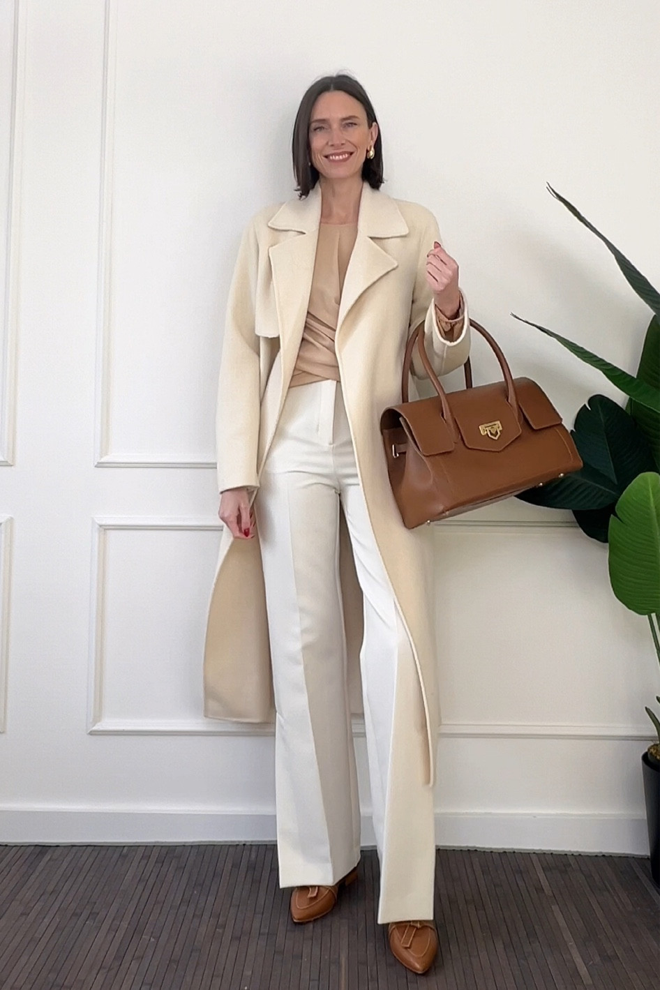 A winter white office look. I love a cream coat to see me through autumn and winter (and spring in the UK, w be honest) I’ve linked a number of lovely ones here. 

The trousers, blouse and shoes are the exact items and all true to size, I would say. 

Tan leather shoes, tan leather bag, cream work trousers, white trouserss

#LTKworkwear #LTKSeasonal #LTKstyletip