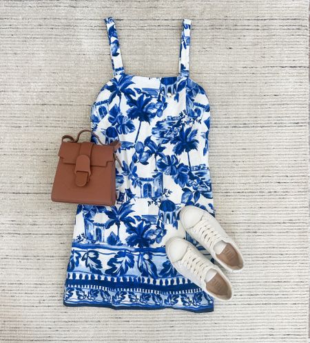 Summer outfit with blue mini dress that would be perfect for vacations, summer outfits, date nights and more! Has a matching mommy and me baby outfit, too. Paired with white leather sneakers, but would also be cute with sandals! On sale! 

#LTKSaleAlert #LTKStyleTip #LTKSeasonal