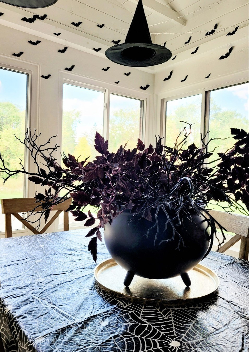 Halloween dining table centerpiece with the prettiest metal cauldron and fall stems! Halloween,  fall decor,  Halloween decorations

#LTKHalloween #LTKHome #LTKFindsUnder50