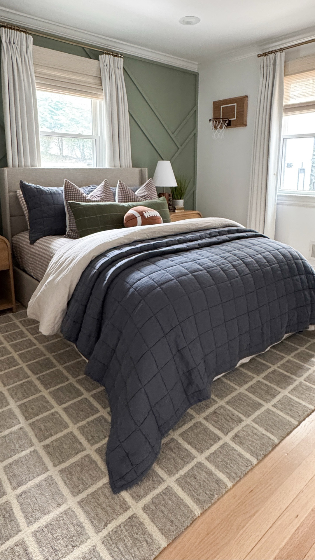 I can’t believe Ryan’s big room refresh is finally here 🏈🤎. 
He’s been asking for a cozy, playful space and this transformation might just be my favorite yet. From the new accent wall color to the layered bedding and that little football touch, he’s completely in love with his new room and I’m swooning with how everything came together. 

#roommakeover #kidsroomdecor #football #kidsbedroom #boysbedroom #boysbedroomdecor

#LTKFindsUnder100 #LTKStyleTip #LTKHome