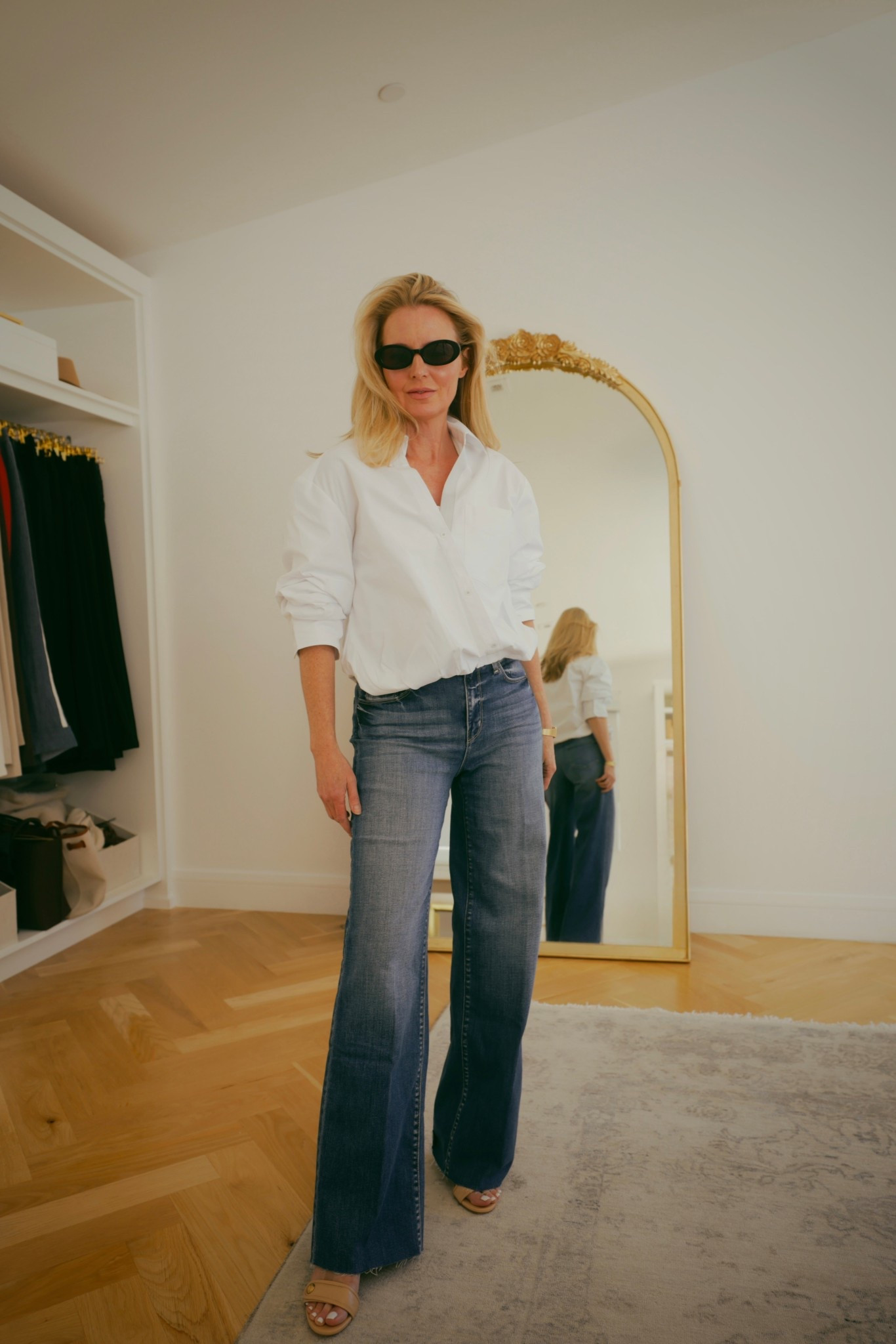 This white button down became an instant favorite for me. It’s so flattering, the criss-cross effect in the front feels very modern, and the bubble hem means no fussing with how to tuck it or wear it. TTS. 🙌🏻 🤍

#LTKOver40 #LTKSeasonal