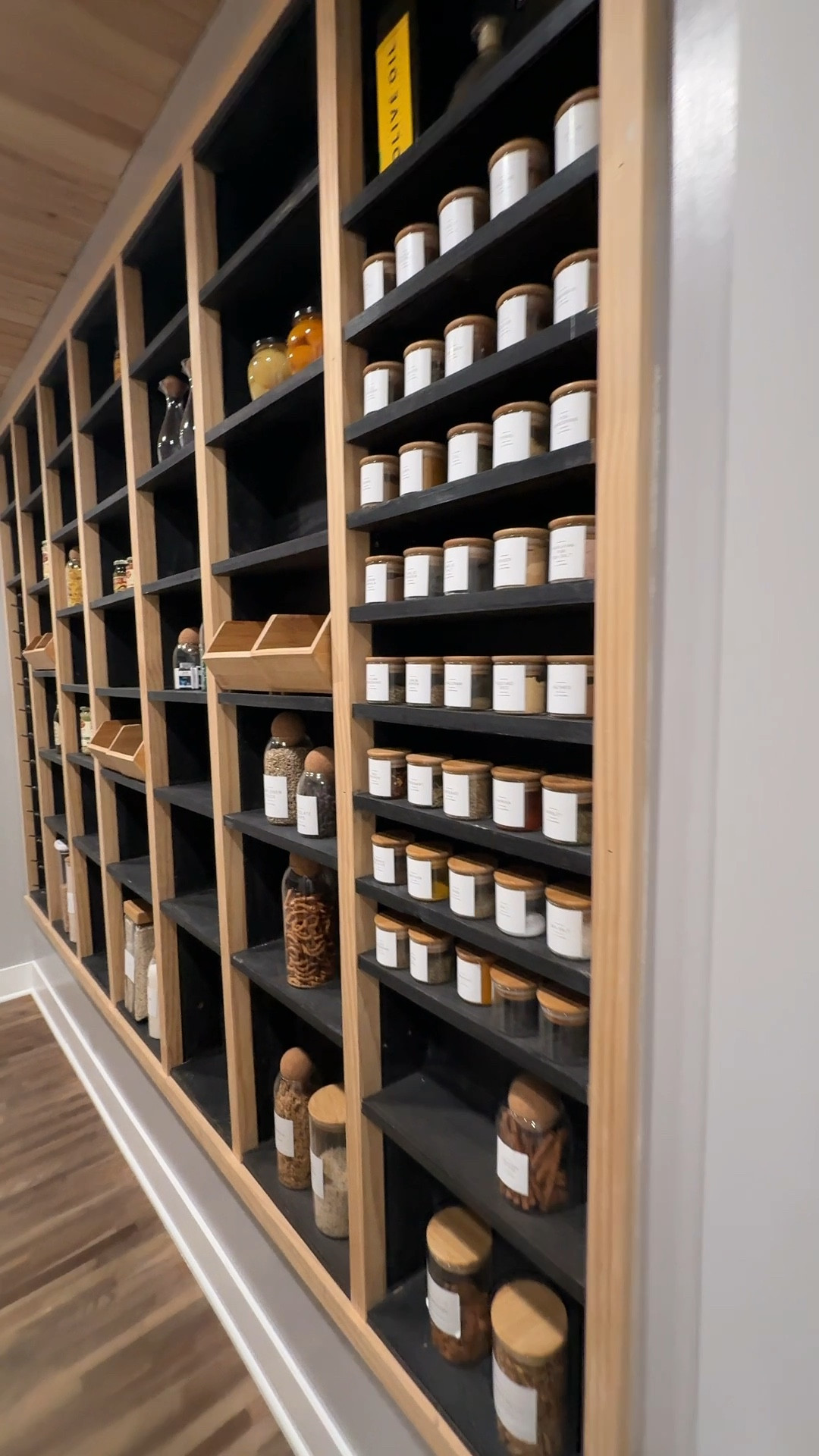 This walk in pantry was planned with every detail in mind. We measured every shelf to fit each custom spice jar, glass container and canned goods. It was built into the actual wall between the studs and trimmed out. I can’t wait to incorporate a similar smaller wall in our new pantry! 

#LTKHome