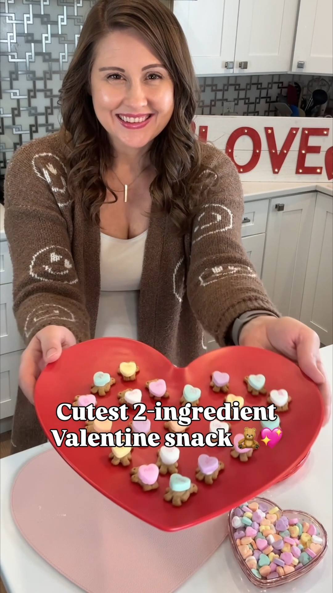 Turn teddy grahams into the cutest little Valentine bears with this super simple snack idea 🧸💖 Just add a tiny dab of frosting and press on a conversation heart — that’s it! Such an easy treat for class parties, playdates, or a fun after-school snack with the kids. Simple, sweet, and totally adorable!

#LTKFamily #LTKHome #ValentinesDaySnacks #EasyValentinesTreat #KidsSnackIdeas #FunWithFood #ValentineTreats #HolidaySnacks

#LTKmomlife #LTKSeasonal #LTKValentine
