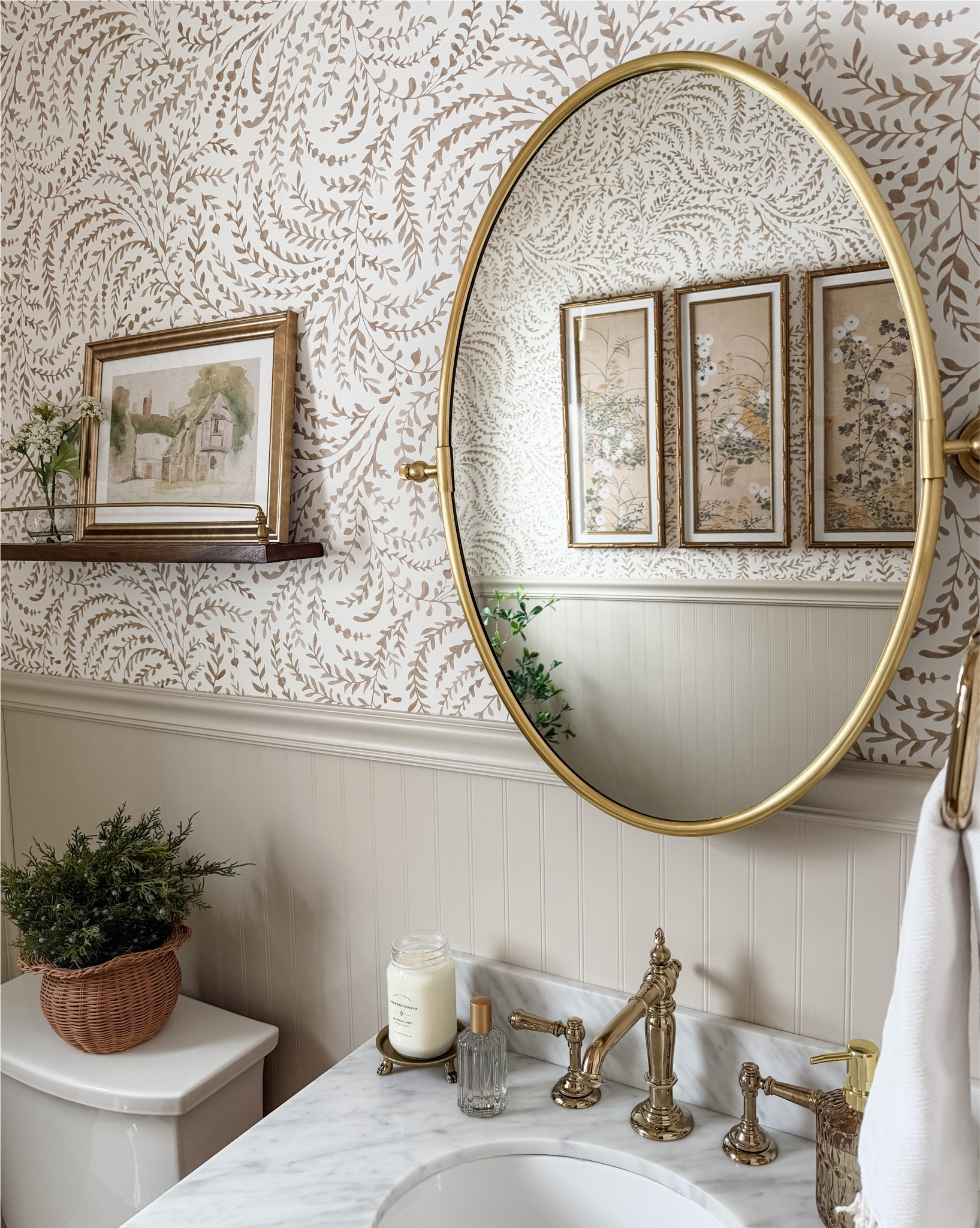 Post-holiday views of the new powder bathroom. How good is the new Target artwork?! Complements the wallpaper perfectly. 😍

#LTKHome