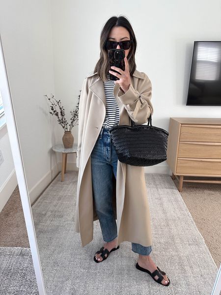 Simple neutral outfits. Simple but elevated outfits. 

Oak and Fort trench xxs
AYR striped tee xs
Rag & Bone jeans 25. Sizes up. 
Hermes Oran sandals 35
Dragon Diffusion tote small
YSL sunglasses 

#LTKshoecrush #LTKstyletip #LTKitbag