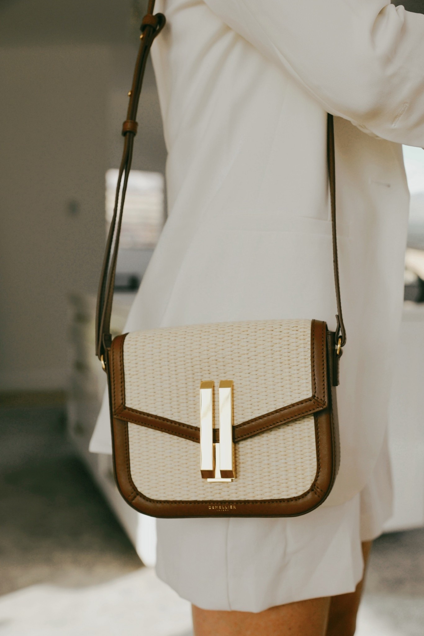 I love this canvas and leather Demellier convertible handbag. It can be worn as either a shoulder bag or crossbody. 

#LTKItBag #LTKSeasonal