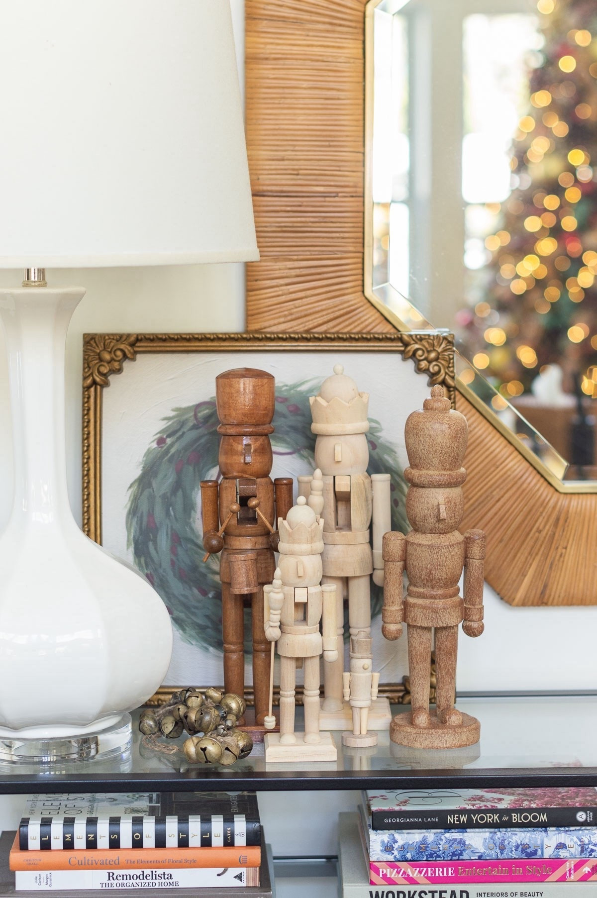 My mom has collected Christmas nutcrackers through the years and while I love her colorful collection, the natural wood nutcrackers really appeal to me. I’ve grouped my collection together on my living room console table and added a Christmas wreath print as the backdrop. home decor Christmas decor living room decor console table styling traditional Christmas 

#LTKHome #LTKHoliday #LTKFindsUnder50