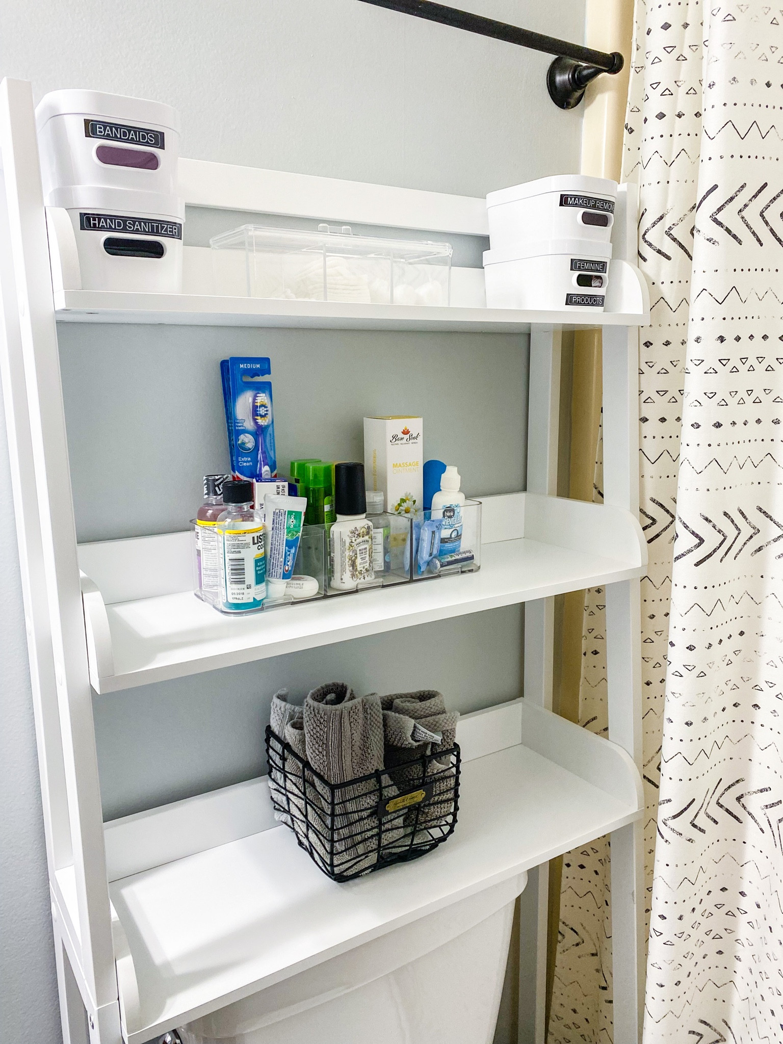 Never leave your guests in a bind with an organized guest bathroom system! A shelf like this with labeled bins and divided organizers allows your guests to easily see and access anything they may need without even having to ask you 🥰 do you like to keep your guest bath stocked with essentials? What do you include!? #guestbathroom #bathroomrestock #bathroomorganization 