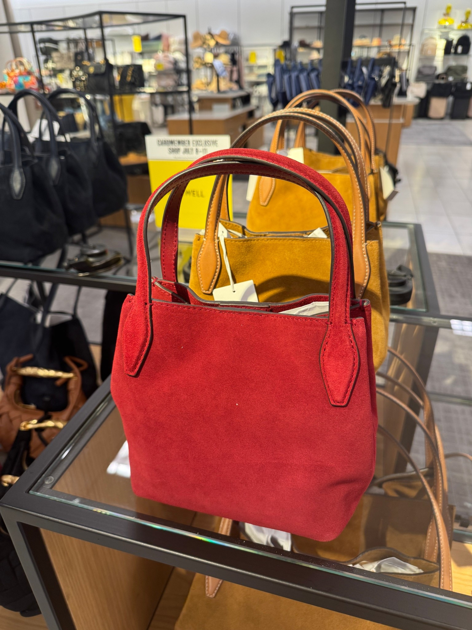 Mini Suede tote in cherry red, deep i dog and tan can be held as a top handle or worn as a shoulder or crossbody bag. Such a great deal and so chic for fall.

#LTKFindsUnder100 #LTKItBag #LTKSaleAlert