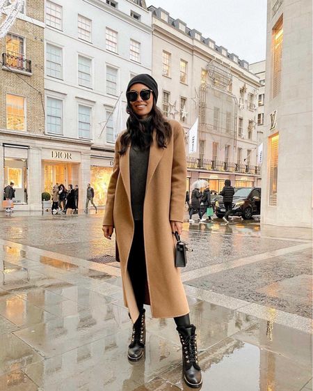 Kat Jamieson of With Love From Kat wears a fall outfit. Camel coat, neutral sweater, black boots, black beanie, black sunglasses, black handbag, fall style, neutral outfit. 

#LTKSeasonal #LTKstyletip