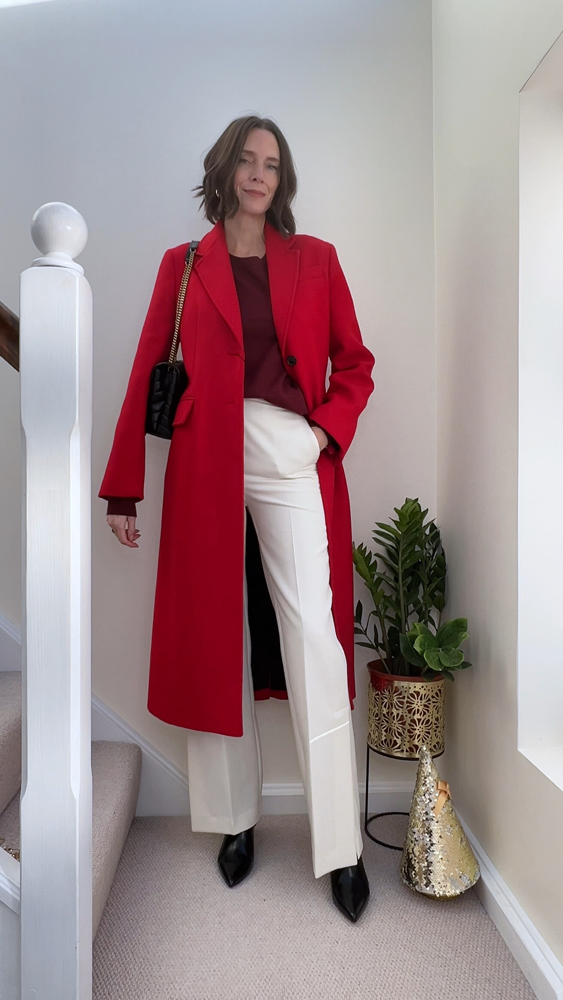 A festive look without the sparkles: smart cream trousers, a dark red knit and red tailored coat  

I’ve also linked the quilted dark red bag that arrived after I filmed this outfit and would have been perfect with it!

#LTKstyletip #LTKHoliday #LTKSeasonal