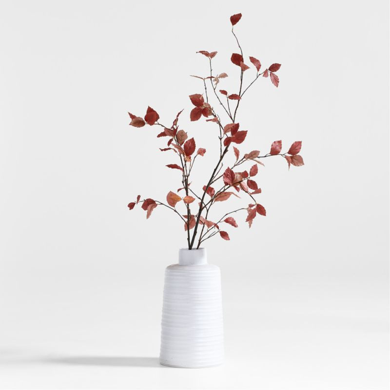 Faux Rust Leaf Branch Arrangement in Holden Speckled White Vase | Crate & Barrel | Crate & Barrel