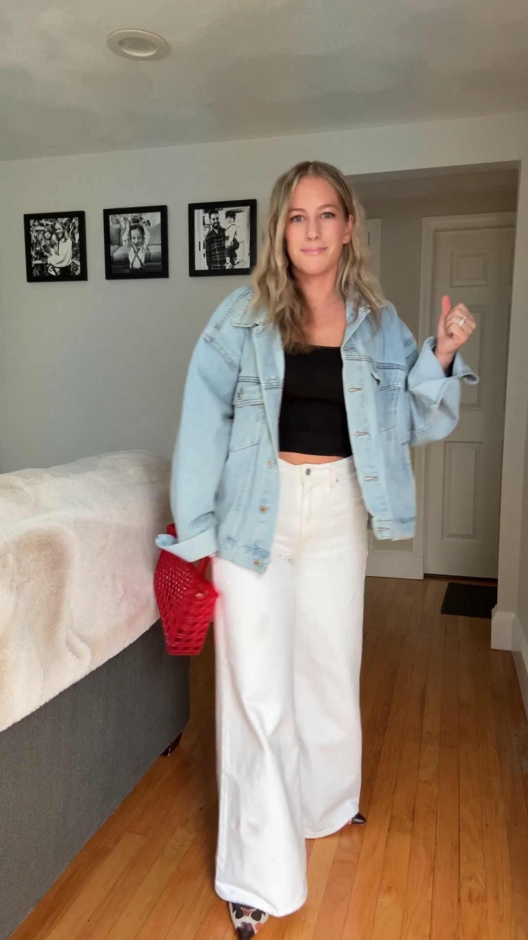 Red jelly tote to die for! She doesn’t have to be worn to the beach! Cow print mules kitten heels. Oversized denim jacket. 
Wide leg white denim 
Black square neck cap sleeve 

#LTKFestival #LTKSaleAlert #LTKootd