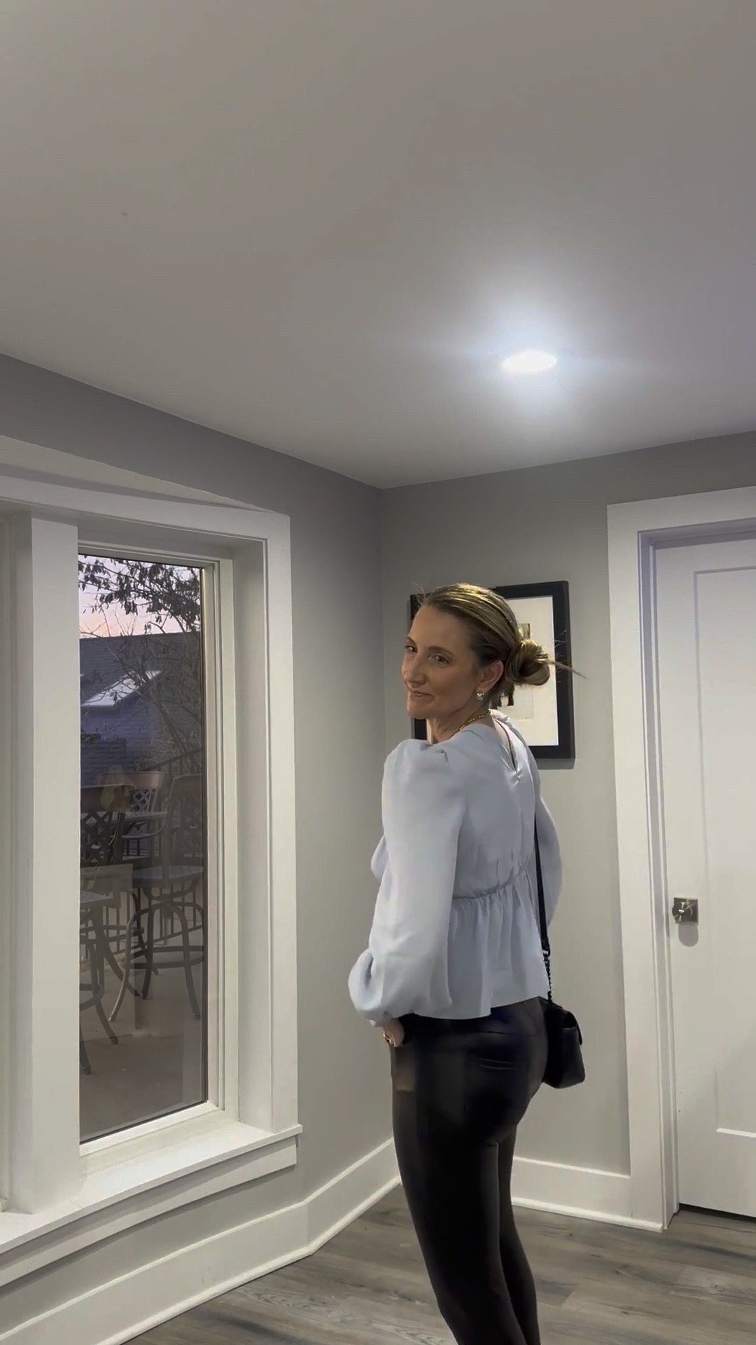 Satin and leather is my current favorite texture mix! 🖤💎 There is nothing like a deep-V puff-sleeve top to make a simple look feel special. It’s all about those 'girly' details that make an outfit pop! Tap the link in my bio to shop the exact pieces on my LTK! 🌟👜 #LeatherLeggings #BlueSatin #EdgyFeminine #LTKfind

Baby blue satin babydoll top, black leather leggings, dark-wash wide-leg jeans, black velvet blazer, black bubble-hem mini skirt, versatile fashion 2026, "girly" aesthetic, puff-sleeve satin top, gold statement necklace, black quilted crossbody bag, LTKstyle

#LTKootd #LTKdayinmylife #LTKOver40