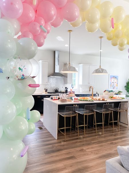 This is the exact same balloon arch as the one in the bounce house, same kit from Amazon (linked). The only difference is I used command hooks to hang it on the wall, make sure you get the heavy duty ones bc these things get heavy! 

#liketkit #LTKfamily #LTKunder50 #LTKkids #donutpartytheme #donutpartydecor #donutbirthday #rainbowsprinkleballoons #balloonarch #donutgrowup #sprinkleparty #donutparty 

#LTKkids #LTKfamily #LTKhome