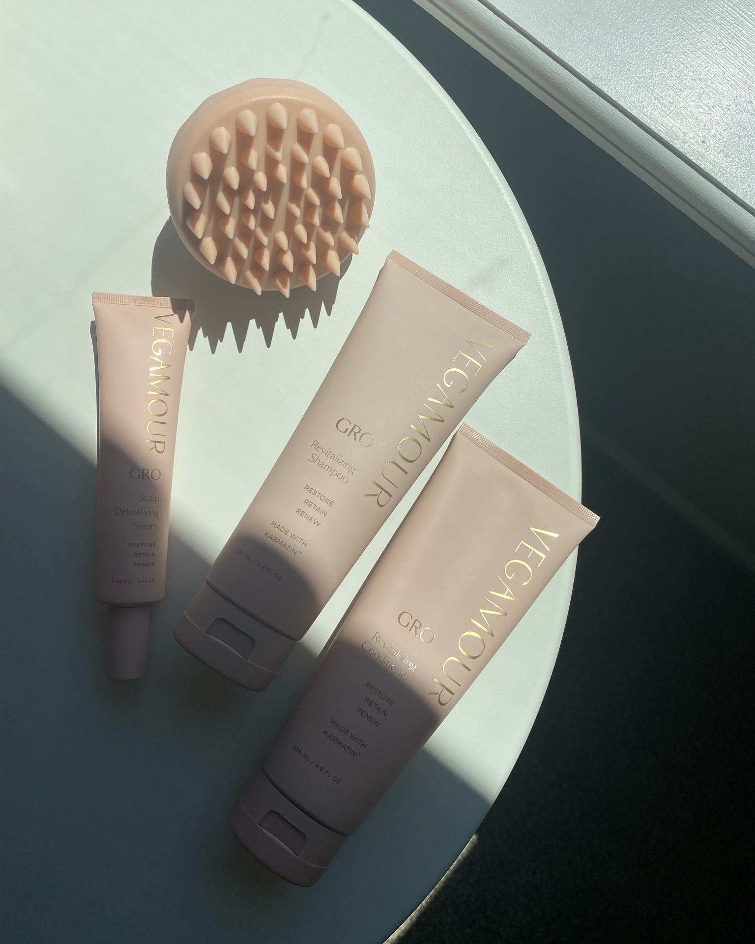 The hair growth shampoo and conditioner I’ve been using for the past year! Vegan and cruelty-free + IT ACTUALLY WORKS for thicker, fuller looking hair!!! Haircare products, vegamour, revitalizing shampoo and conditioner, scalp detoxifying serum and scalp massager! 

#LTKunder50 #LTKbeauty #LTKFind