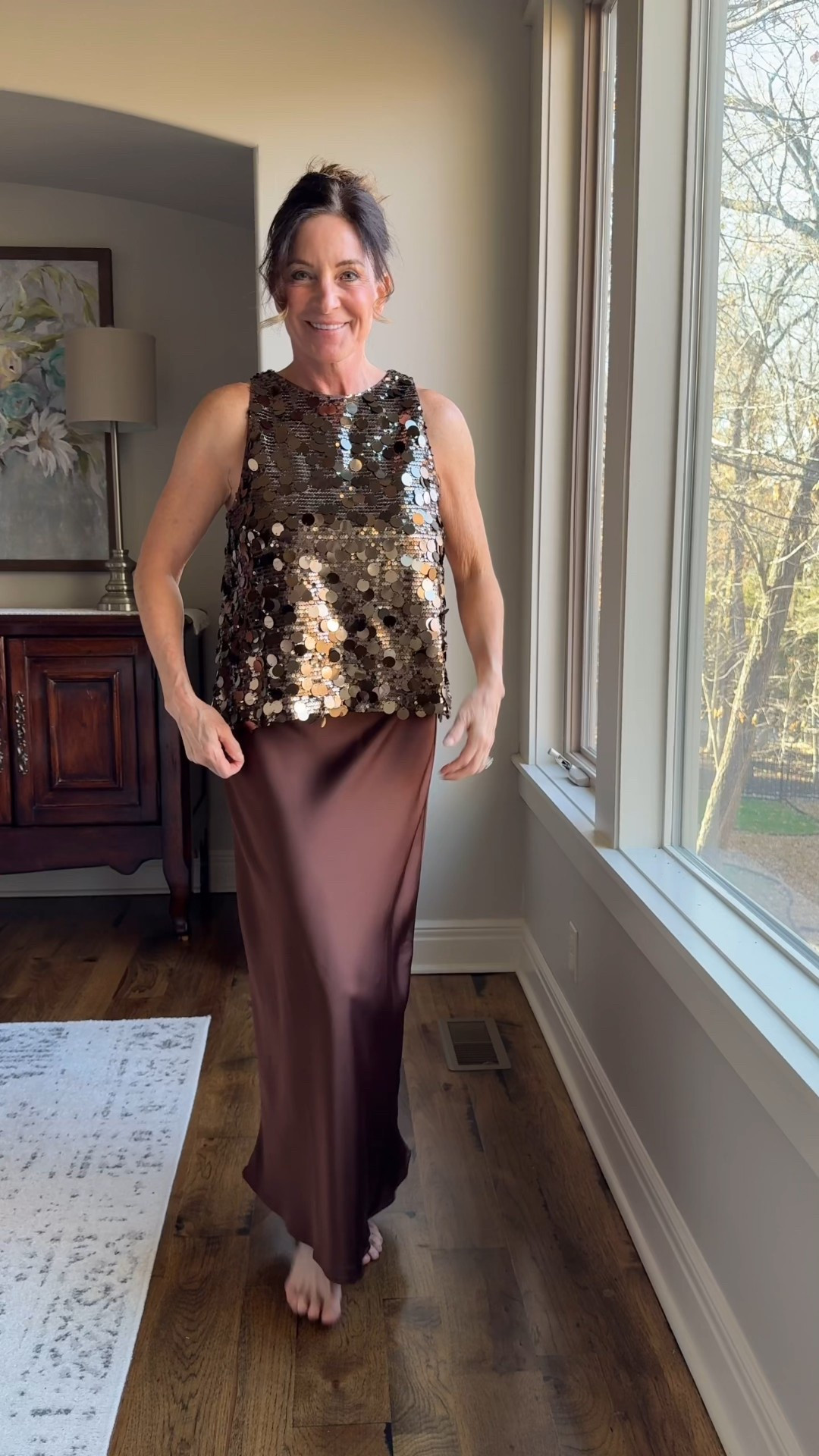 Serving shimmer + satin tonight ✨🤎. This sequin top and ombré satin skirt combo is giving full holiday-party glam with zero effort. If you need a statement look that feels chic, elegant, and a little bit extra… this is the outfit.

#LTKStyle #HolidayOutfit #SequinTop #SatinSkirt #AmazonFashion #PartyOutfit #FormalStyle #Over40Style #ElegantFashion #WinterEvents #affiliate

#LTKHoliday
