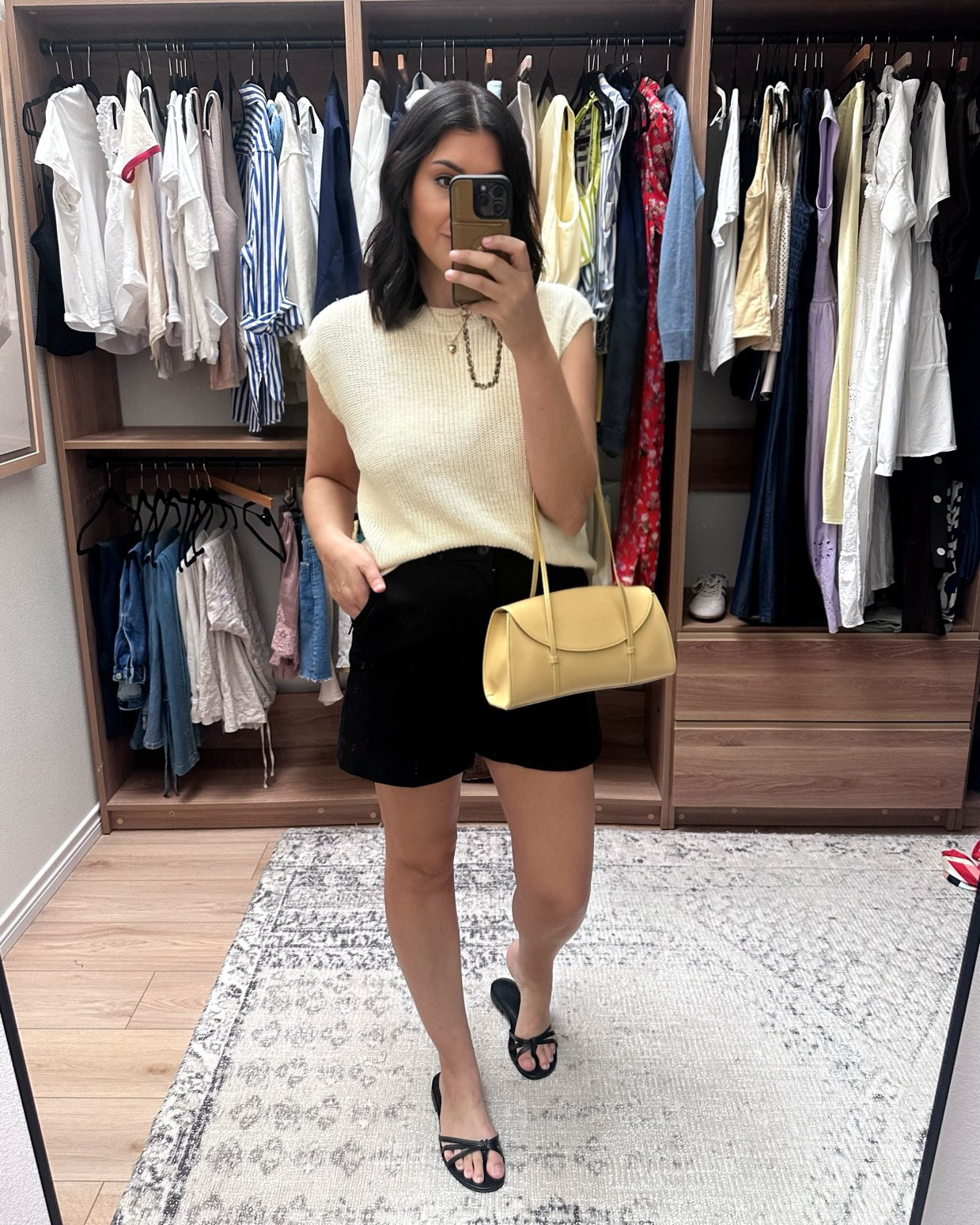 This sweater tank from @quince is one of my favorites for spring / summer (worn alone) and fall / winter (layered over tops!)  I'm in the large. 

These spanx shorts are a great length -- not short but not quite Bermuda. I'm in the large, they run slightly looser overall.  

 