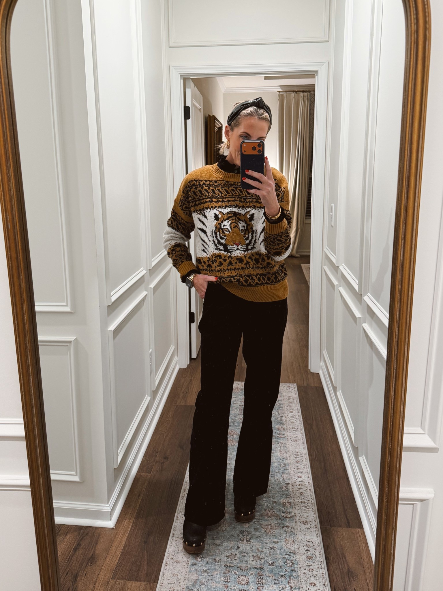 You are in luck this amazing tiger sweater is still on clearance under $60 from Anthropologie. That is a great deal. I linked up so many pant and top options to go with it.  

#LTKmomlife #LTKOver40 #LTKootd