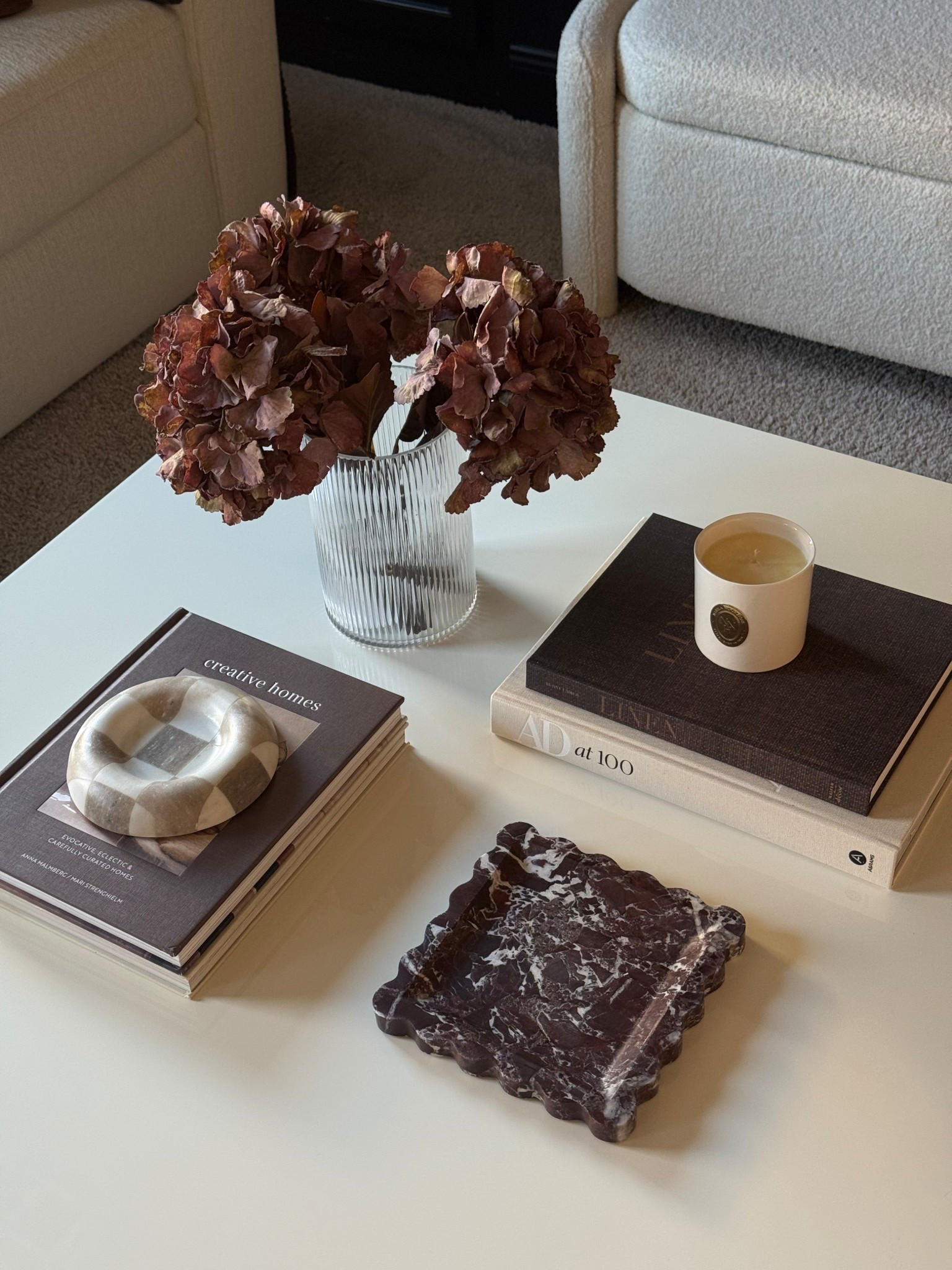 Loving my current coffee table set up🖤 I can’t link the candle (nabela noor home) or the faux florals (hobby lobby) but everything else is linked! 

#LTKSeasonal #LTKFindsUnder100 #LTKHome