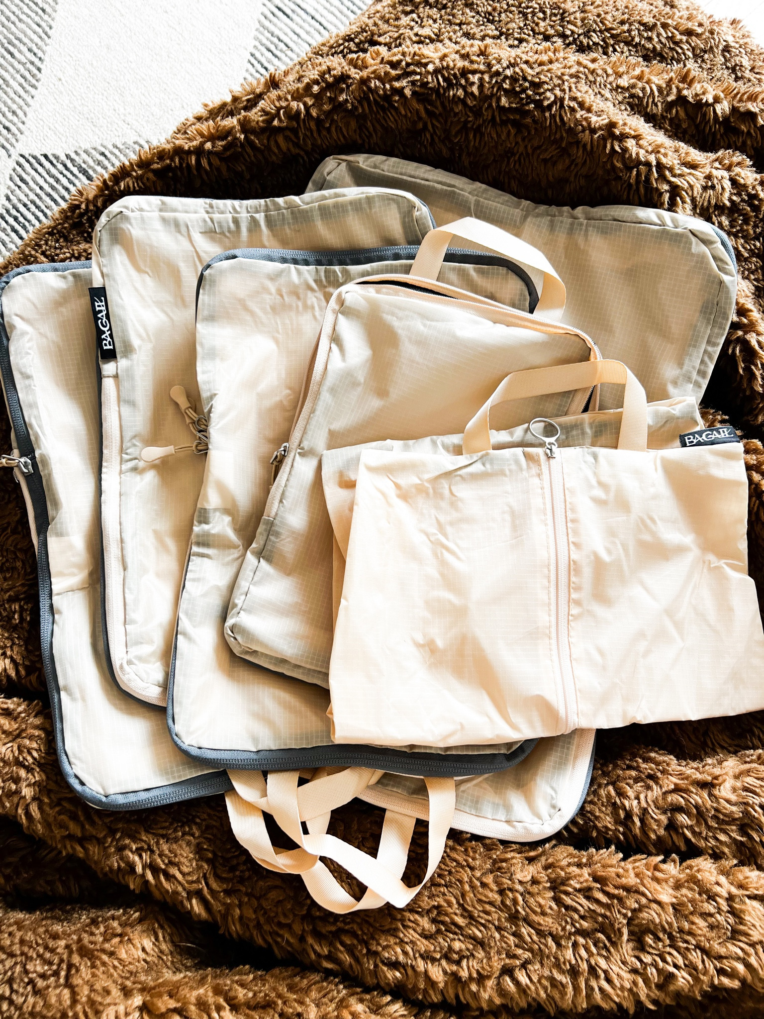 compressible packing cubes for the win! pro tip from my sister-in-law: pack different legs of your trip into different cubes so you only have to pull one cube out at a time! 

#packingtip #europetrip #vacationtip #packingforeurope #compressiblecubes #packingcubes 

#LTKGiftGuide #LTKtravel #LTKfindsunder50