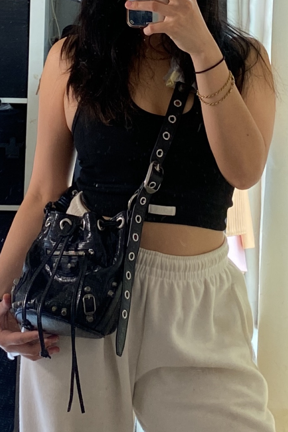 Balenciaga Le Cagole XS Bucket Bag 

Edgy cool bag, shiny leather, bucket bag, silver details, adjustable strap, heart mirror + small extra pouch 

#LTKeurope #LTKitbag #LTKFind