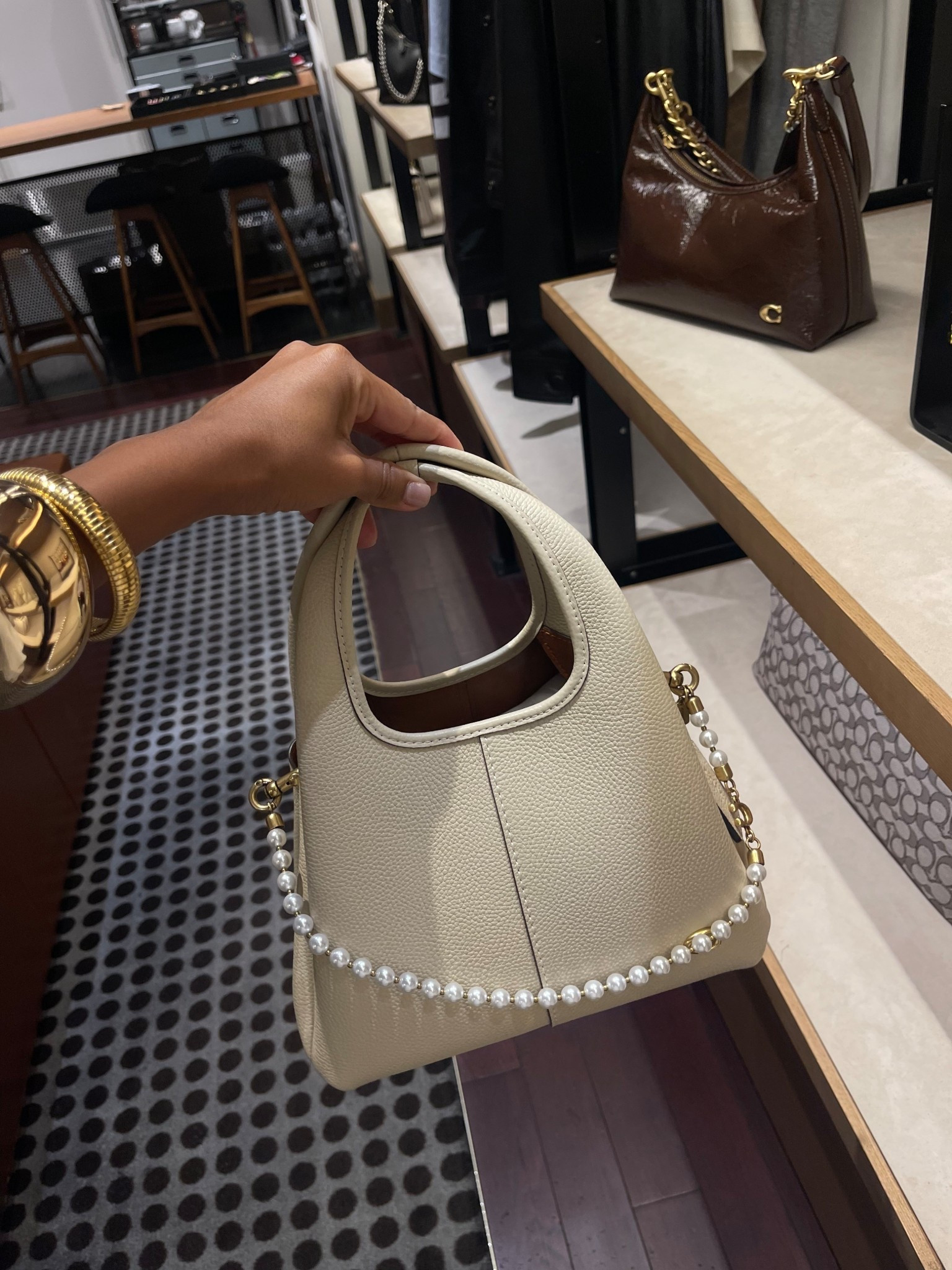 Lana shoulder bag (pictured is the smaller one) with the pearl chain !! LOVE 

The Lana bag also comes in a larger size (also linked) 