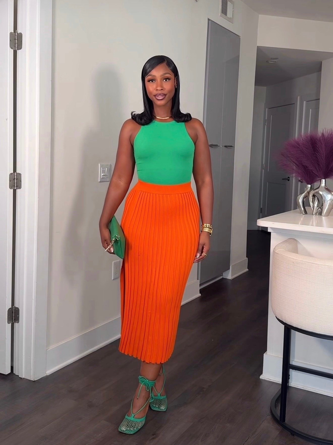 This green + orange combo had no business eating this hard. The pleated midi skirt gives effortless polish, while the matching accessories pull everything together without trying too hard. Perfect for brunch, rooftop cocktails, or when you just want to be the best dressed in the room. ✨

#LTKgrwm #LTKootd #LTKSeasonal