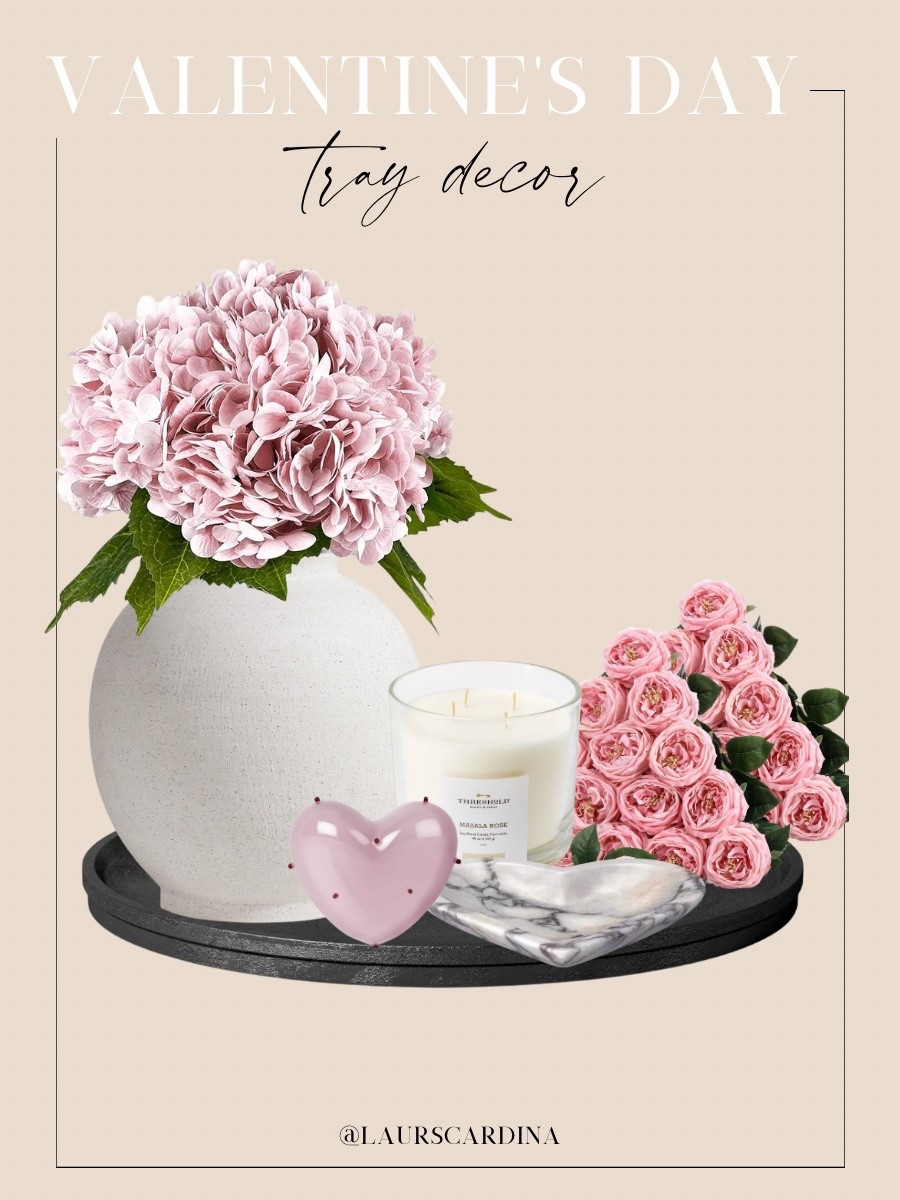 Valentine’s Day tray decor includes a white pot with faux hydrangeas and roses, a candle, glass heart, and a marble heart tray.

Home decor, Valentine’s Day decor, holiday decor

#LTKHome #LTKFindsUnder50 #LTKSeasonal