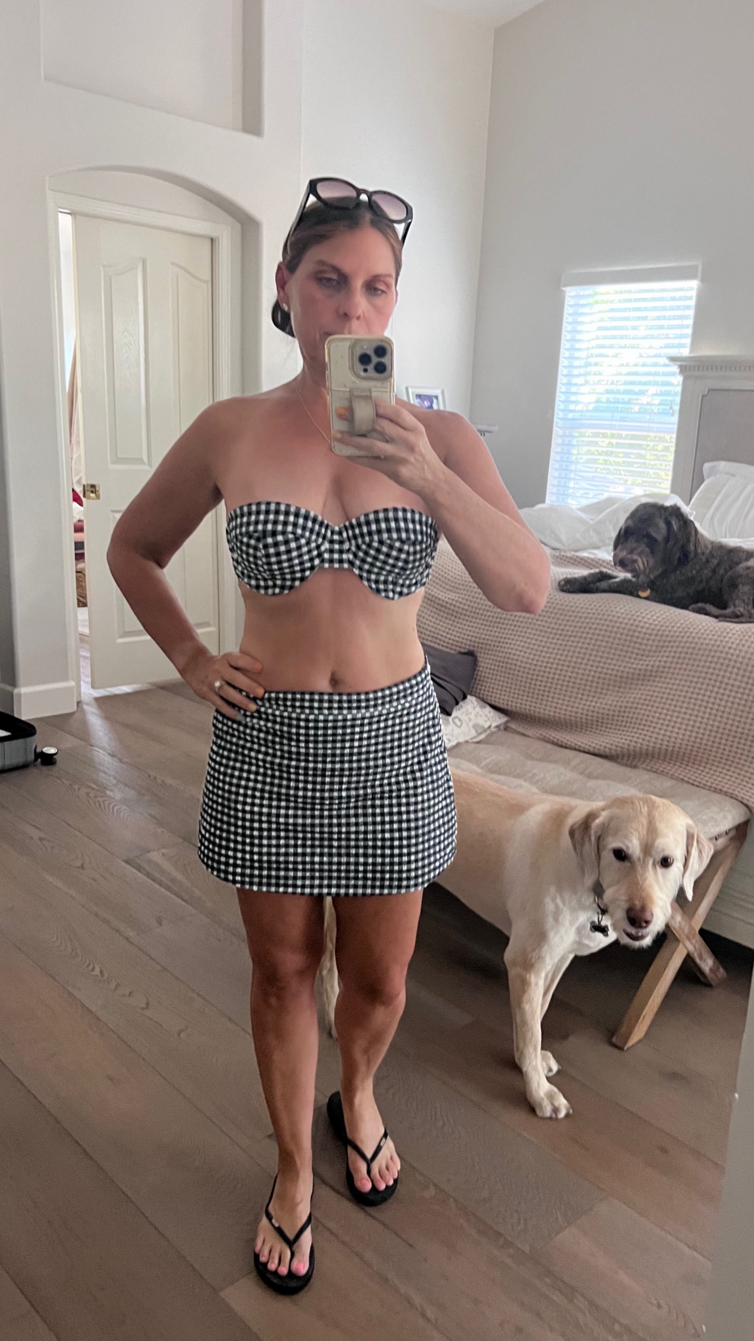 50% OFF SALE: 
This Gingham Bikini Swimsuit is 50% off with the code FORTH
this super cute swimming suit has removable straps and a belt and bottoms with an attached swim skirt. 

#LTKstyletip #LTKSeasonal #LTKsalealert