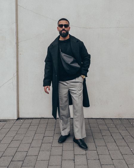 FEAR OF GOD Overlapped Sweater in ‘black’ (size M), Everyday Trouser in ‘grey’ (size M), and The Mule in ‘black leather’ (size 41). FEAR OF GOD x GREY ANT glasses. THE ROW Slouchy Banana Bag in ‘black’. A relaxed and elevated men’s look that makes for great business casual office wear or for a night out. Classic black and grey tones. Some items from this look are up to 60% off on sale and I’ve linked similar alternative items as well. 

#LTKmens #LTKsalealert #LTKstyletip