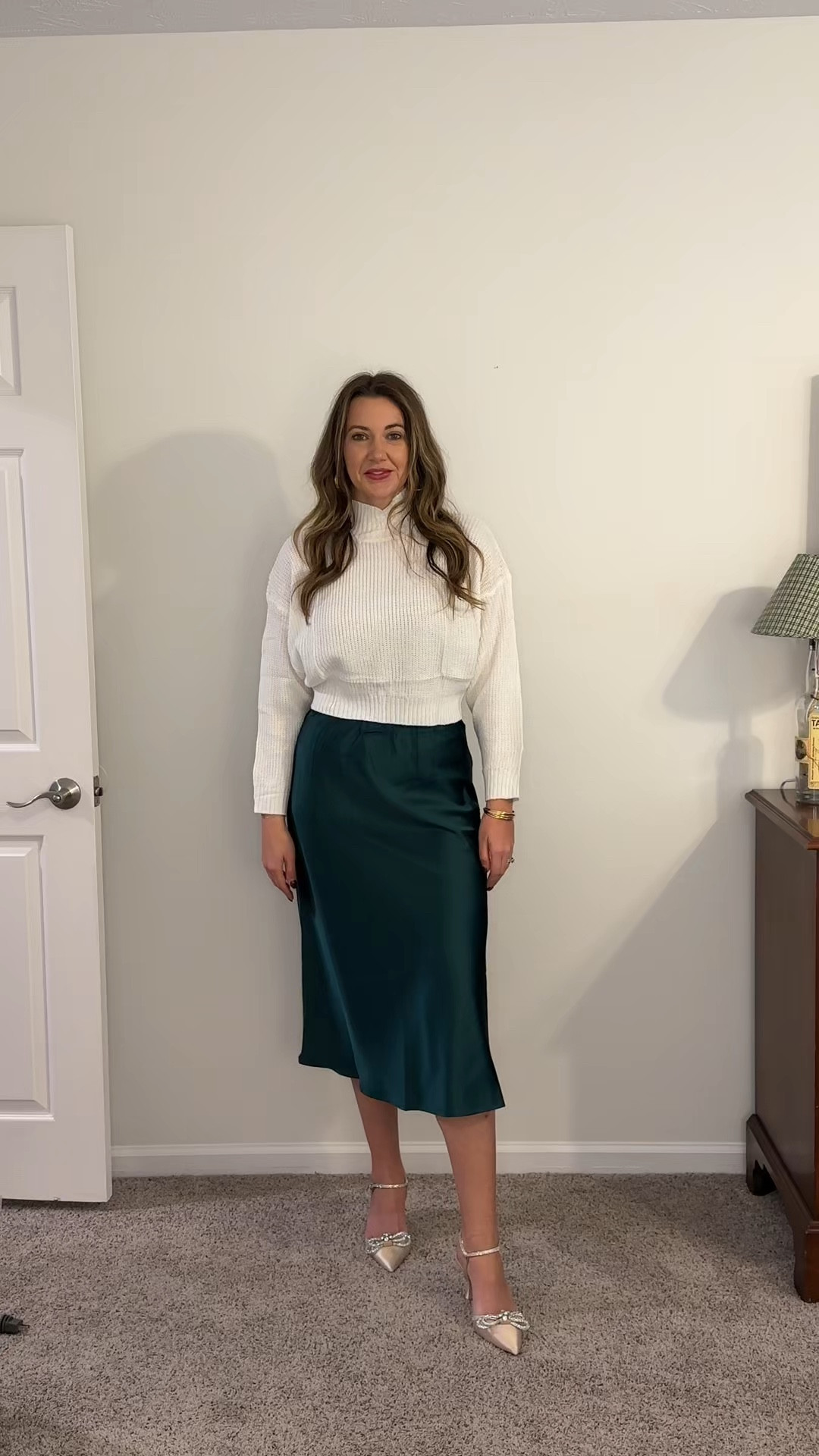 Cozy meets chic- A cropped sweater, a silky skirt, and the cutest bow-detail shoes—your holiday outfit is officially handled! 

#LTKStyleTip #LTKHoliday #LTKFindsUnder50