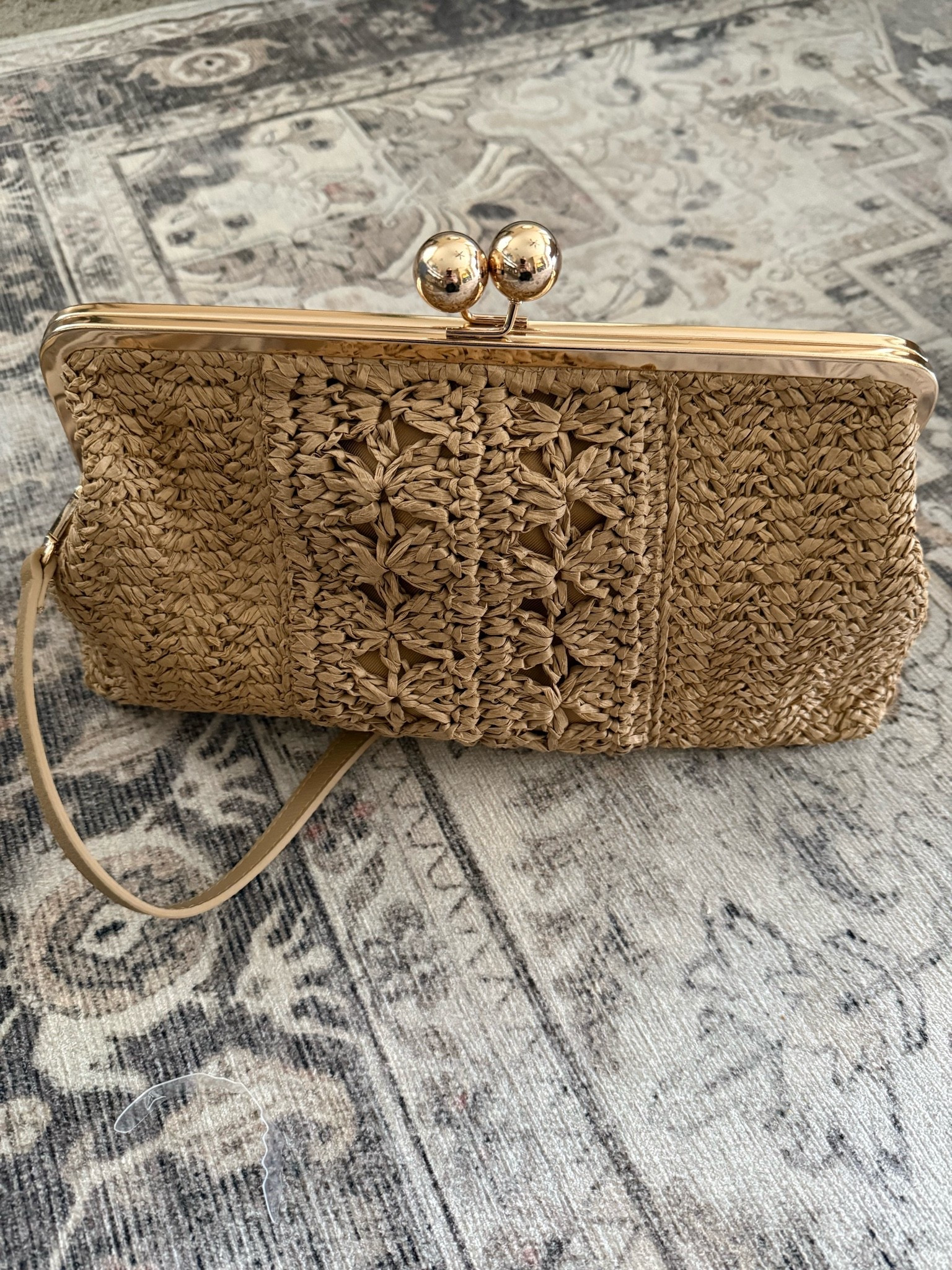 Straw Kiss Lock Clutch Bag from Target trending now. This summer bag is fun, affordable and lightweight. While it may be a bit larger than what I would consider a clutch, it also has a removable shoulder strap. I particularly love the clasp closure.

#LTKSeasonal #LTKmomlife #LTKWedding