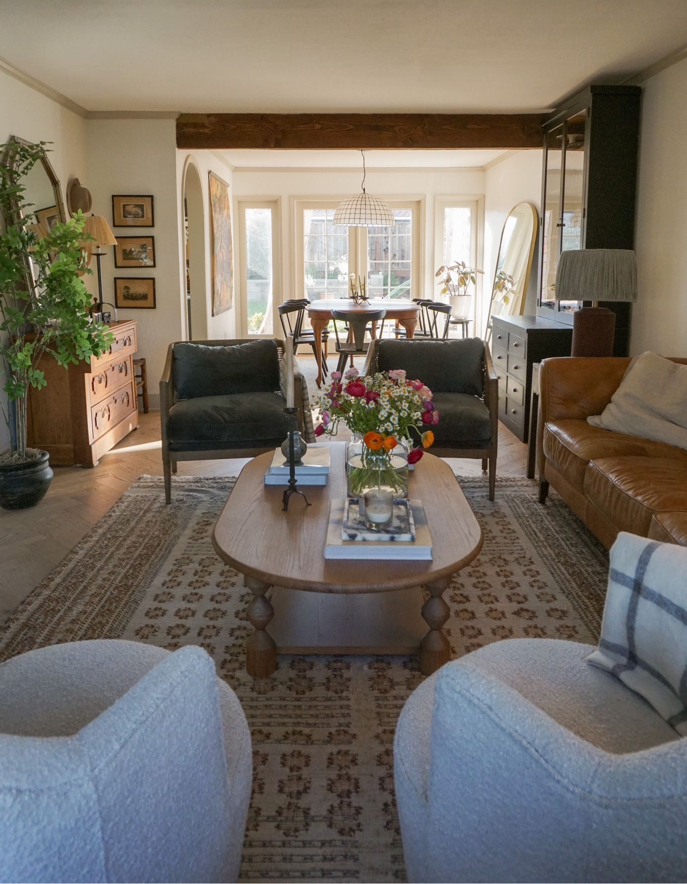 My living room from a different angle 💕 This coffee table was a splurge, but I don't regret it! 
-
Living room decor. Home decor. Lulu and Georgia. Area rug. Bucle chair. Accent chair. Sofa. Leather sofa. Amazon finds. Faux tree. Coffee table. Dining room decor. Dining chair. 

#LTKSeasonal #LTKunder100 #LTKhome