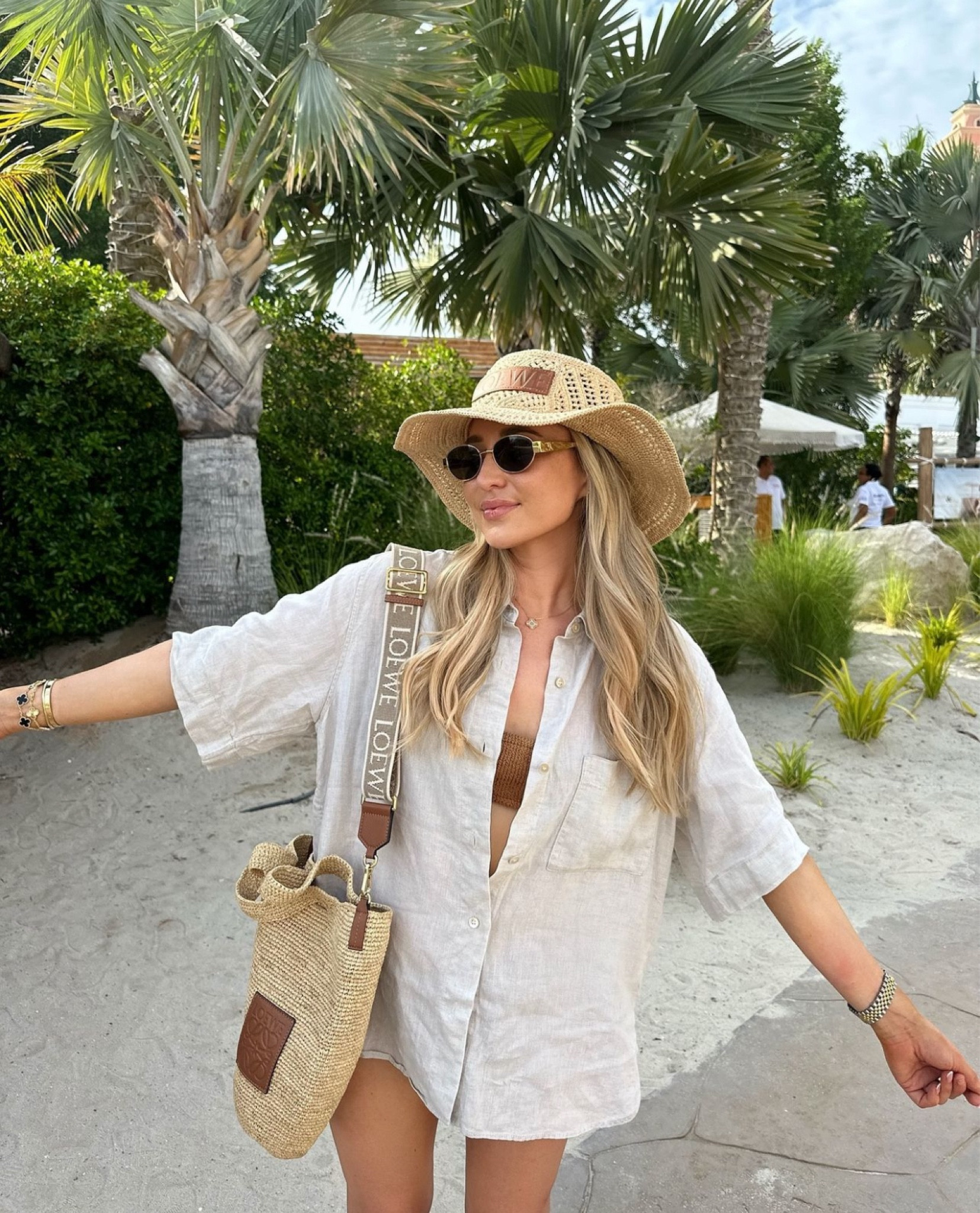 Enjoying the summer sun in the best neutral linen outfit 🐚🤍 Arket beige resort shirt and shorts, with Hunza G gold bikini and Loewe straw raffia hat and bag

#LTKluxury #LTKtravel #LTKsummer