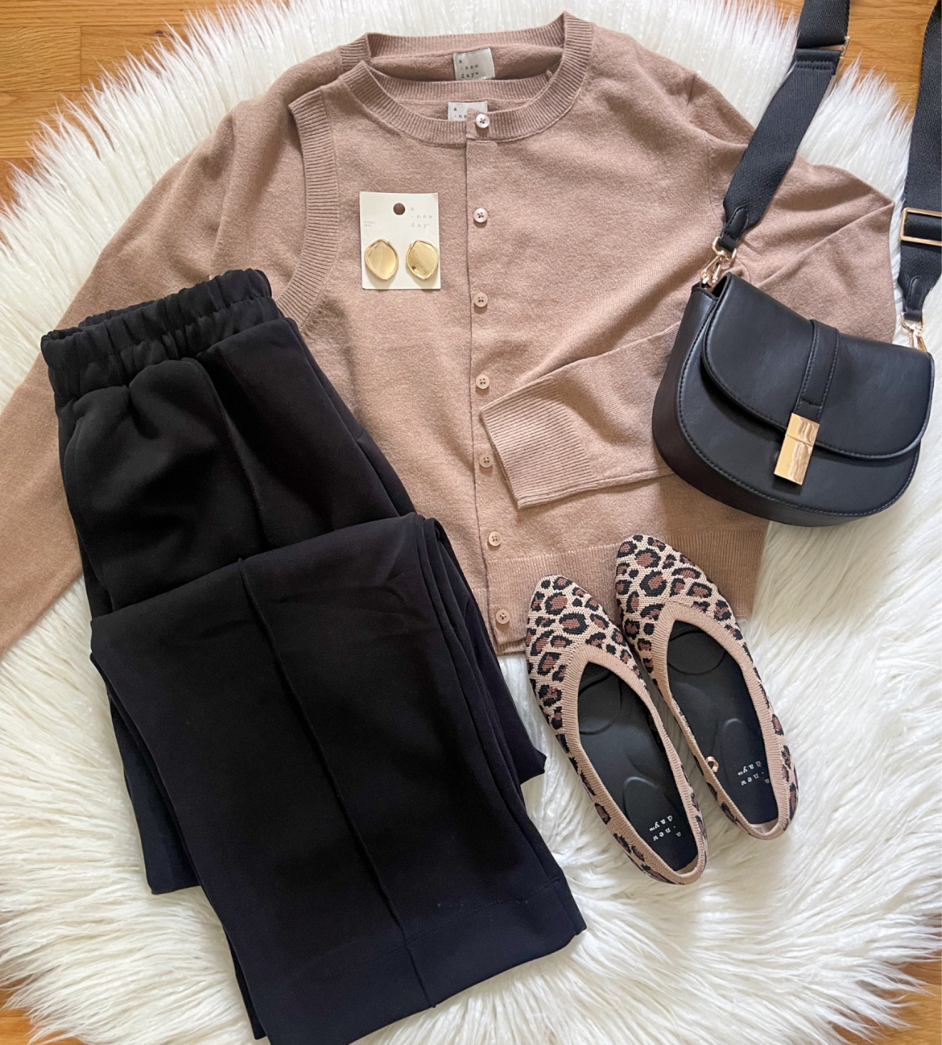 Comfy Work Friendly Look 🖤  These pants are soooo comfy!  Love the material and wider leg style!  Loving this tank/cardigan combo and they come in a bunch of colors!  Perfect for transitioning into fall!  Everything here is linked for you. Have a great night!

#LTKStyleTip #LTKFindsUnder50