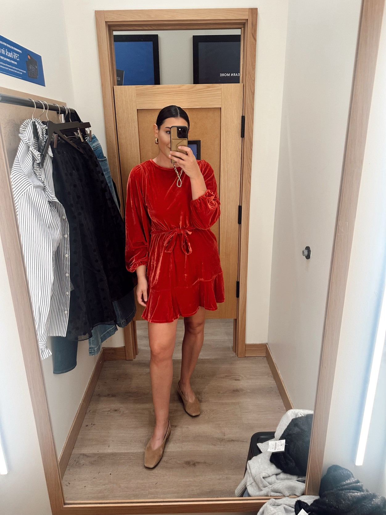 I'm in the large but it runs big! It's a really pretty red, but comes across more paprika here. Also comes in Black! 

There are also little girl dresses that match too! 

 #LTKHoliday #LTKFindsUnder100