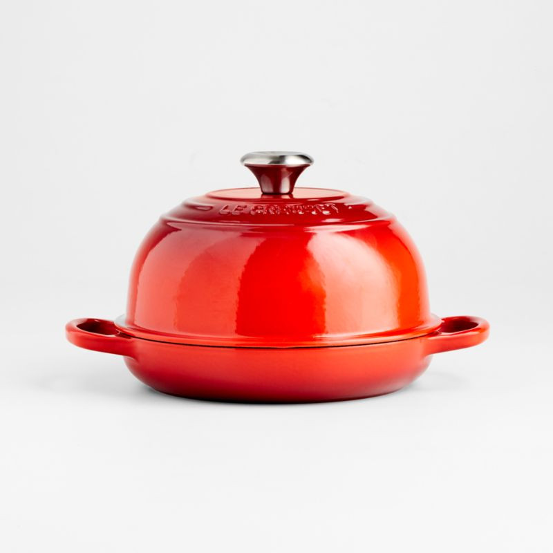 Le Creuset 9.5" Cerise Red Enameled Cast Iron Bread Oven | Crate & Barrel | Crate & Barrel